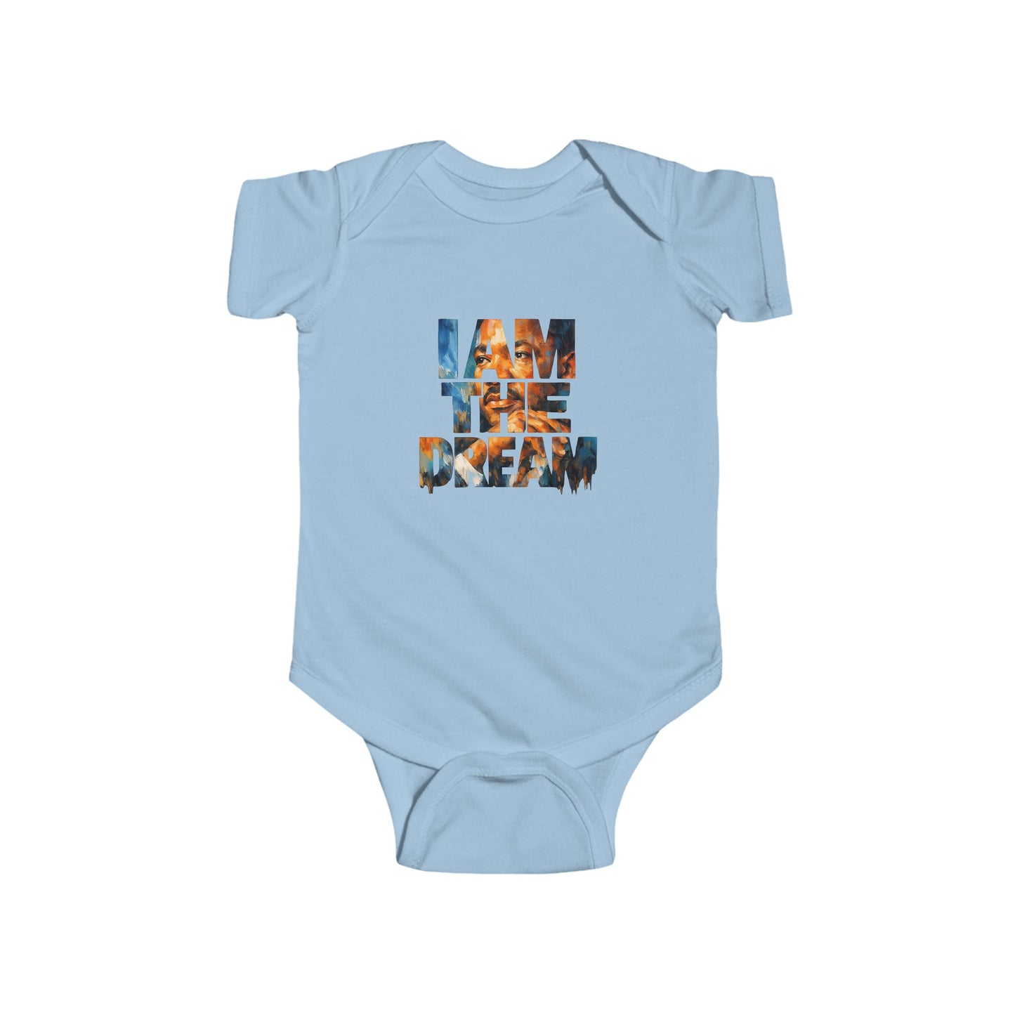 Light blue baby onesie with 'I AM THE DREAM' text on a white background