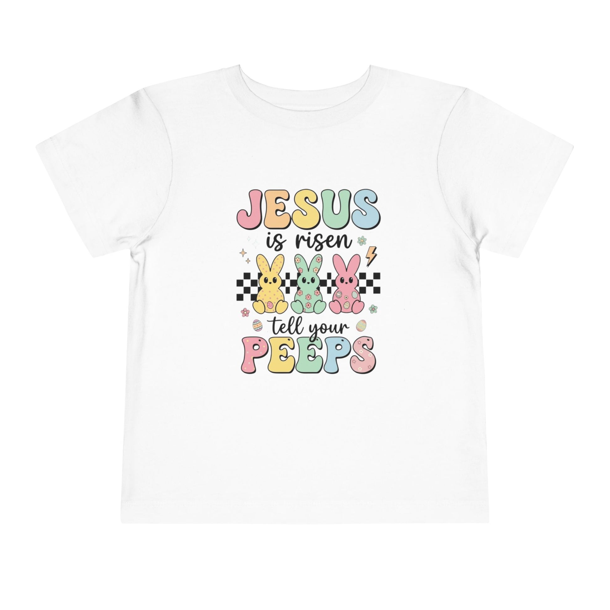 White t-shirt with colorful Easter text and bunny graphics on a white background