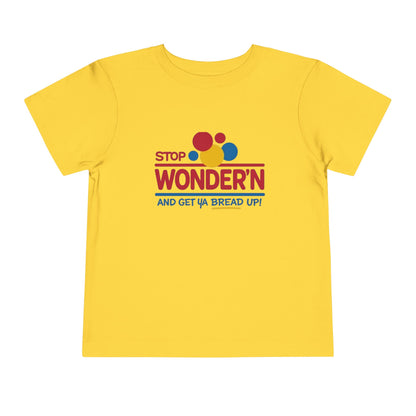 Yellow t-shirt with colorful text design 'stop wondering 'on a white background