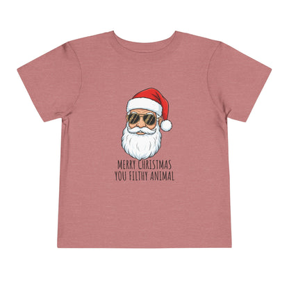 Pink t-shirt with a graphic of Santa Claus wearing sunglasses and a text 'Merry Christmas You Filthy Animal' on a white background.