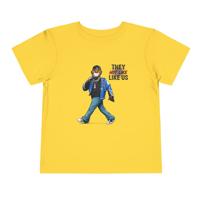 Yellow t-shirt with a graphic of a person wearing a mask and text on a white background