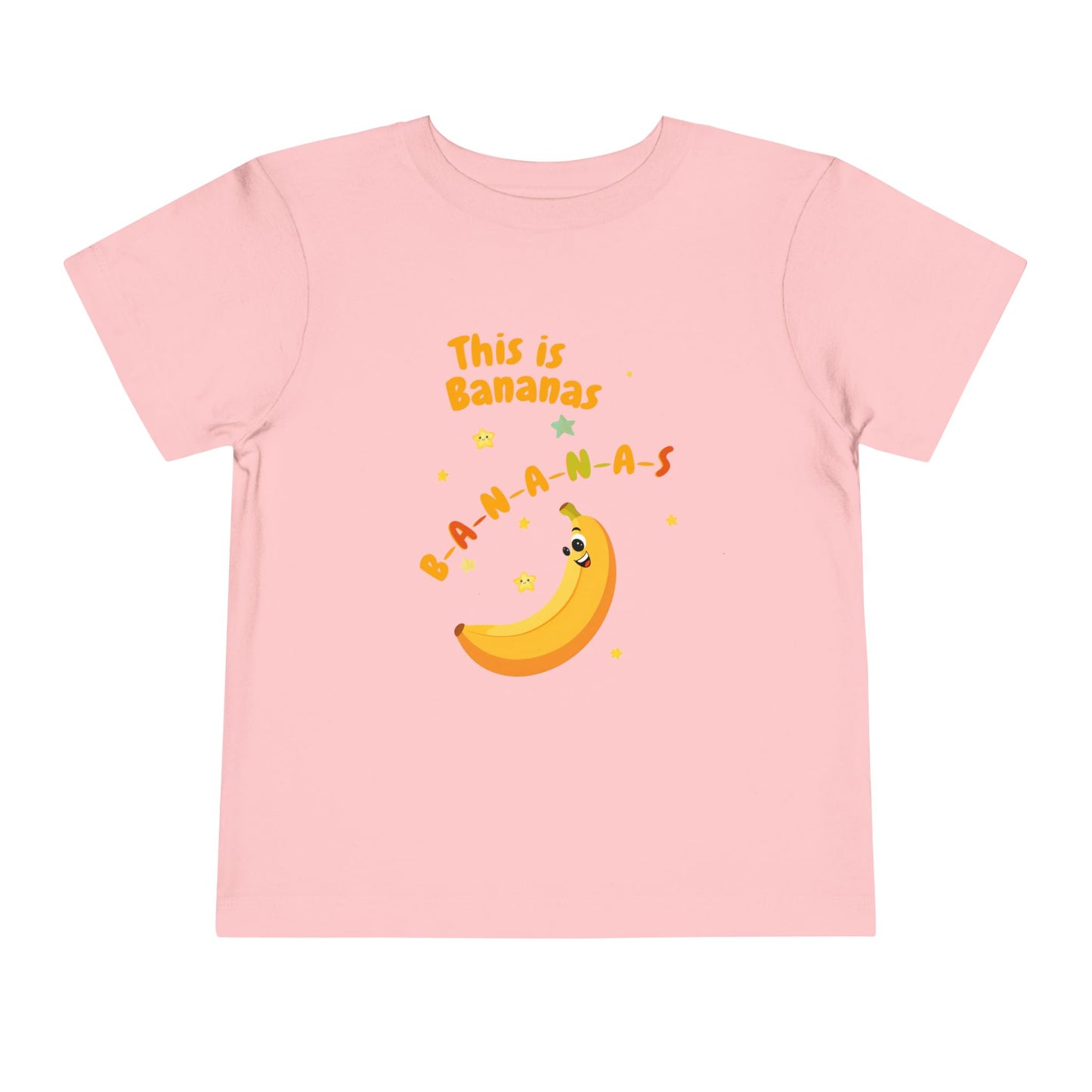 Pink t-shirt with a banana graphic and text on a white background