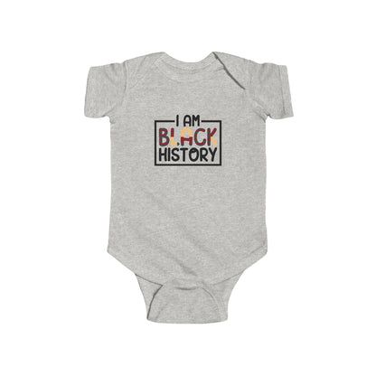 Gray baby onesie with 'I AM BLACK HISTORY' text on a white background