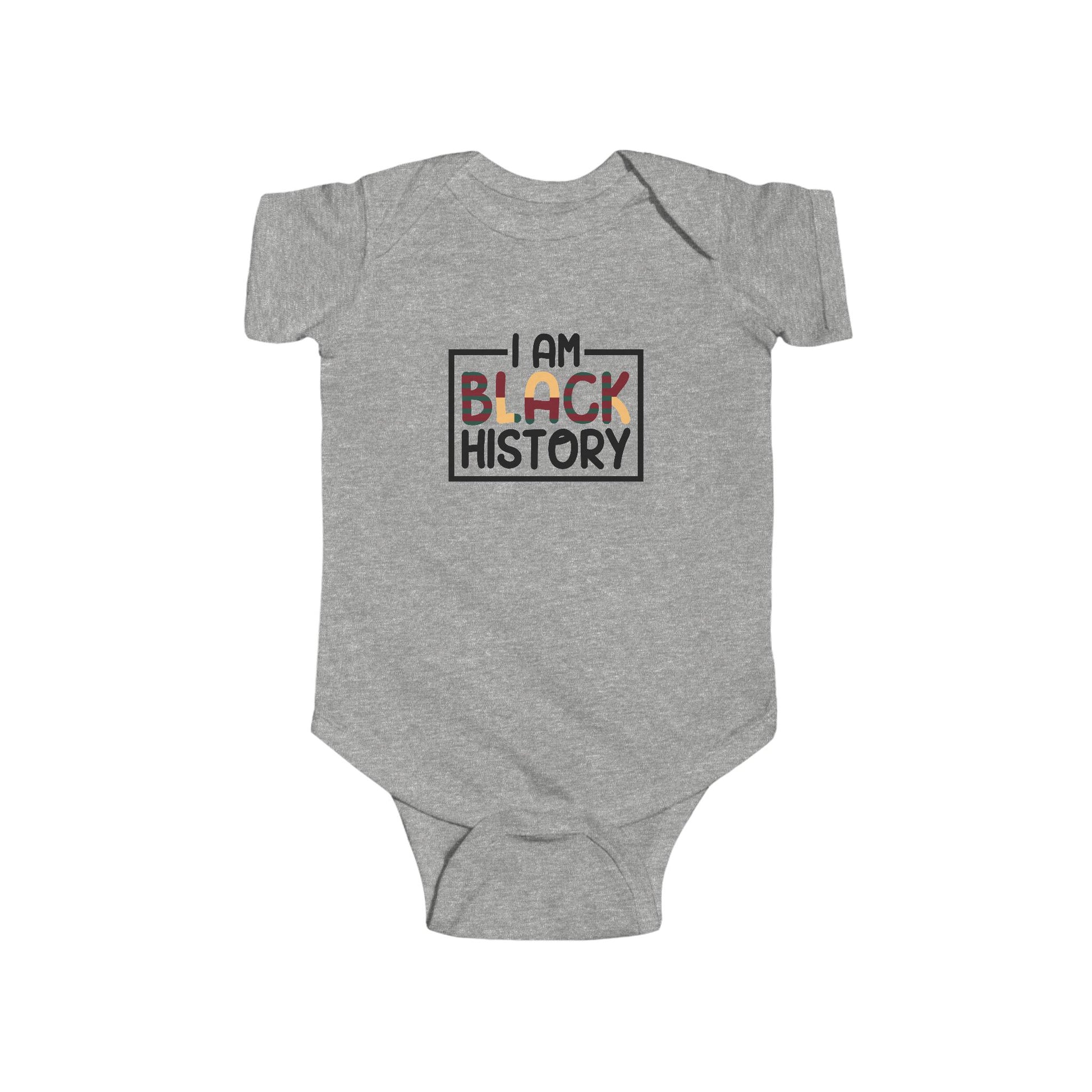 Gray baby onesie with 'I AM BLACK HISTORY' text on a white background