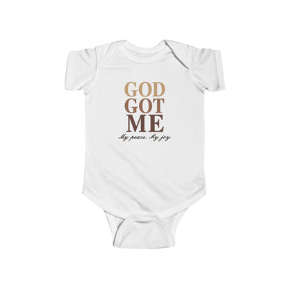 White baby onesie with 'God Got Me' text on a white background