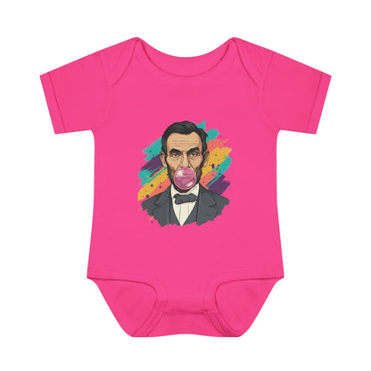 Pink baby onesie with a colorful graphic of Abraham Lincoln on a white background