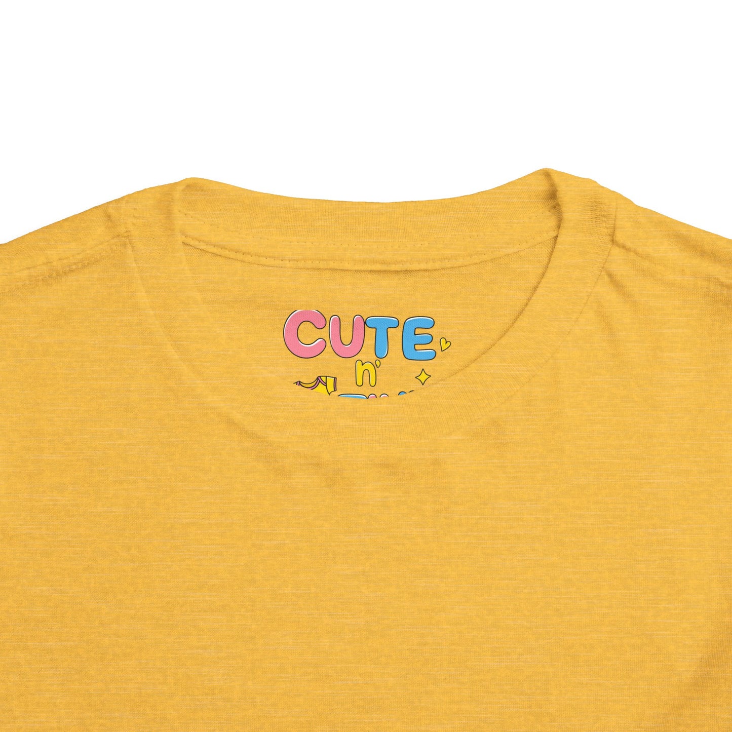 Yellow t-shirt with colorful 'CUTE' text on a white background