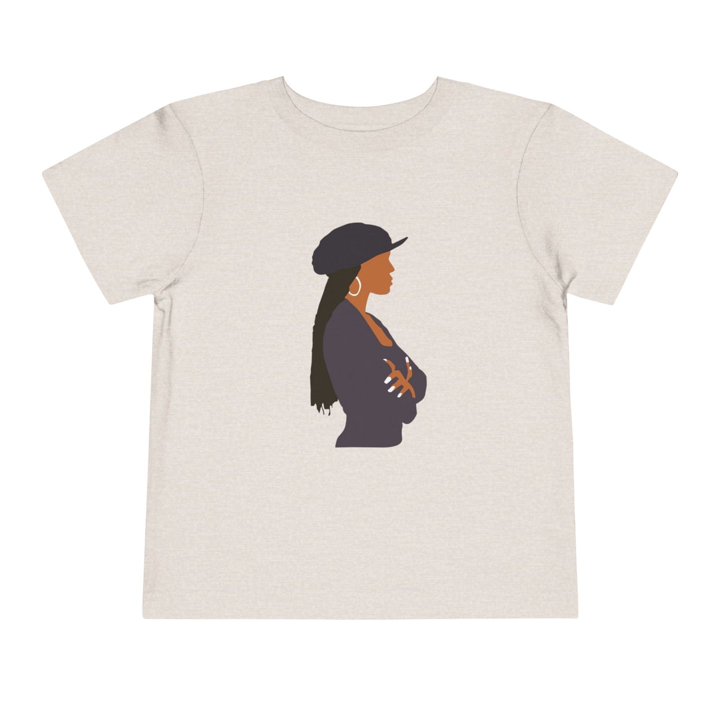 Beige t-shirt with a graphic of a woman wearing a hat on a white background