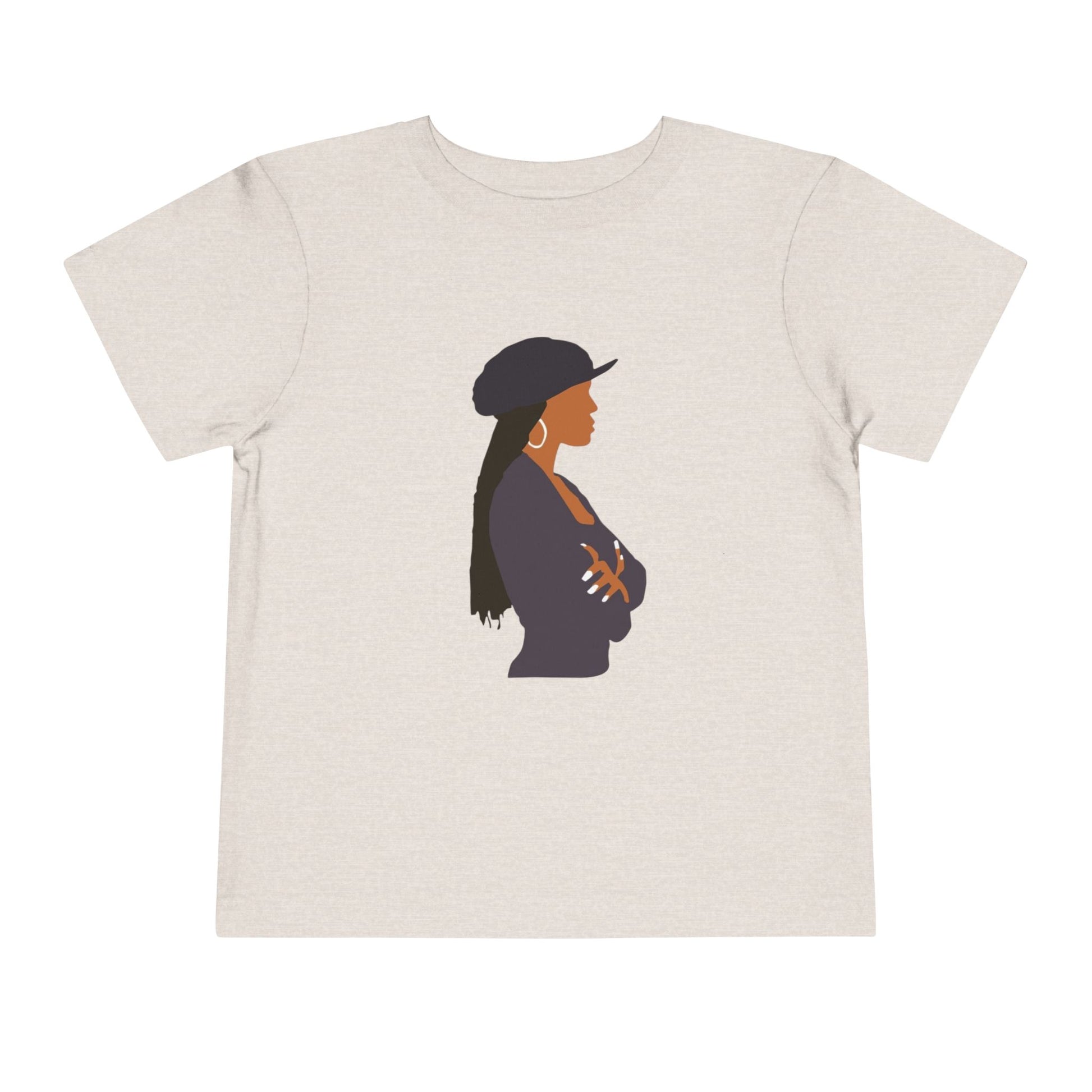 Beige t-shirt with a graphic of a woman wearing a hat on a white background