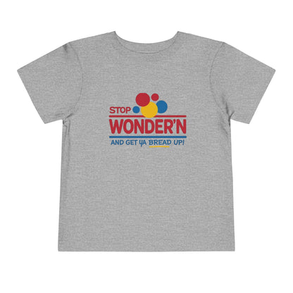 Gray t-shirt with colorful graphic 'stop wondering ' text on a white background