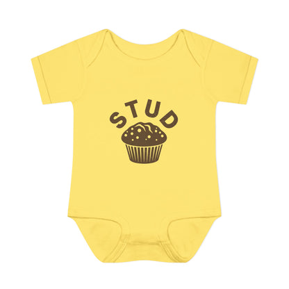 Yellow baby onesie with 'STUD' and a muffin graphic on a white background