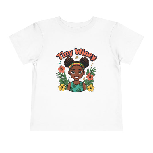 Child wearing a yellow t-shirt with 'Tiny Winey' design on a white background