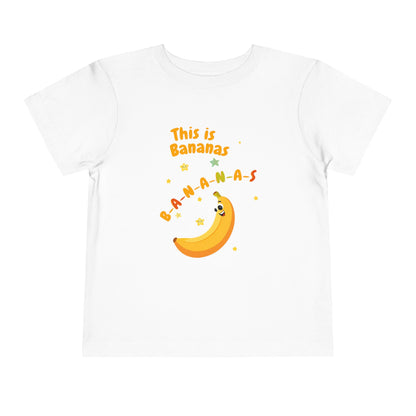 White t-shirt with a banana graphic and text on a white background