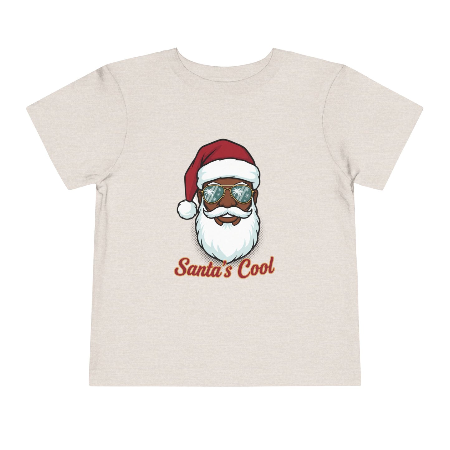 Beige t-shirt with a graphic of a cool Santa Claus wearing sunglasses and 'Santa's Cool' text on a white background.