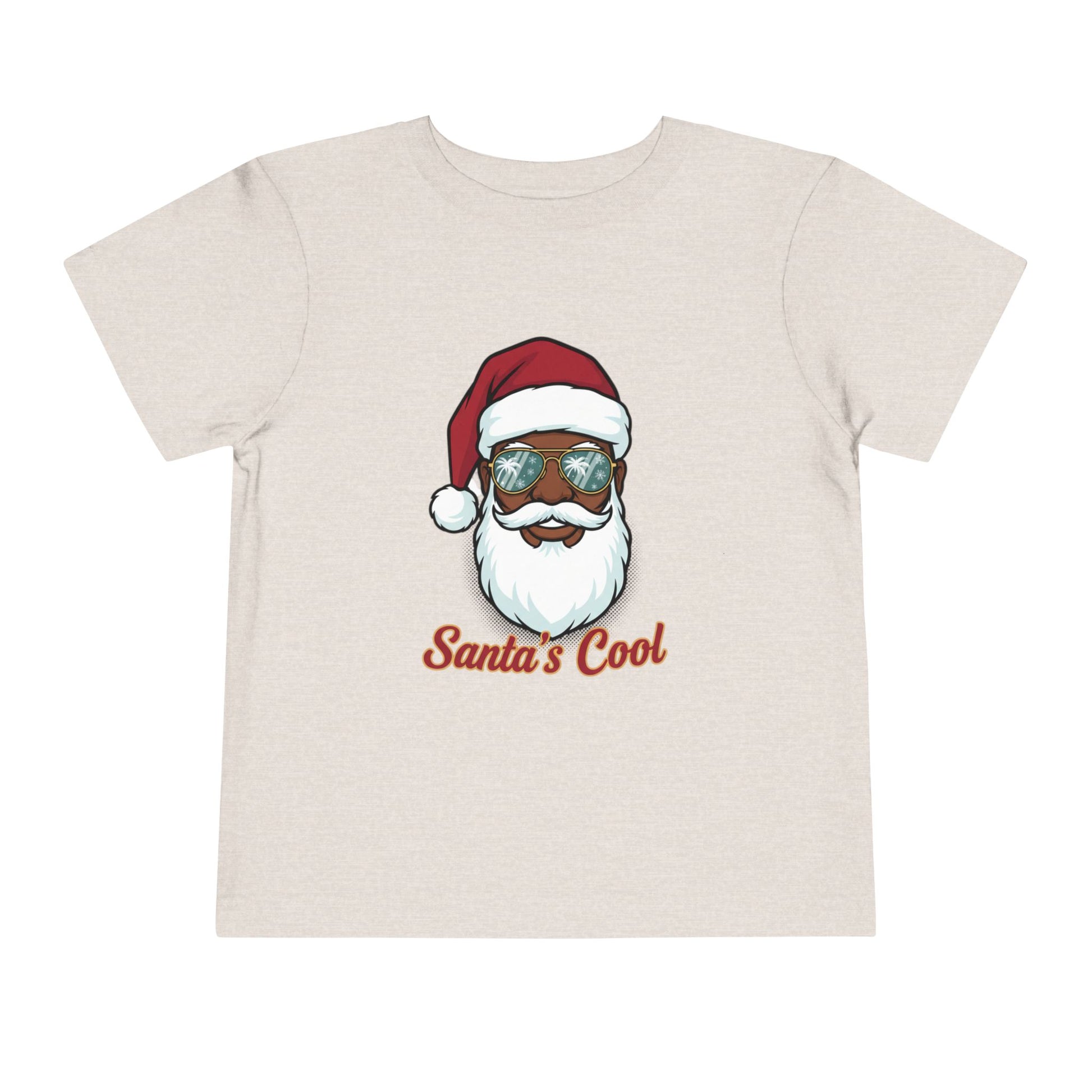 Beige t-shirt with a graphic of a cool Santa Claus wearing sunglasses and 'Santa's Cool' text on a white background.
