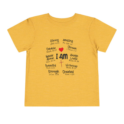 Yellow t-shirt with motivational text and a red heart on a white background