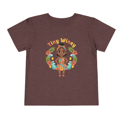 Children's t-shirt with a graphic of a girl and 'Tiny Winey' text on a brown background