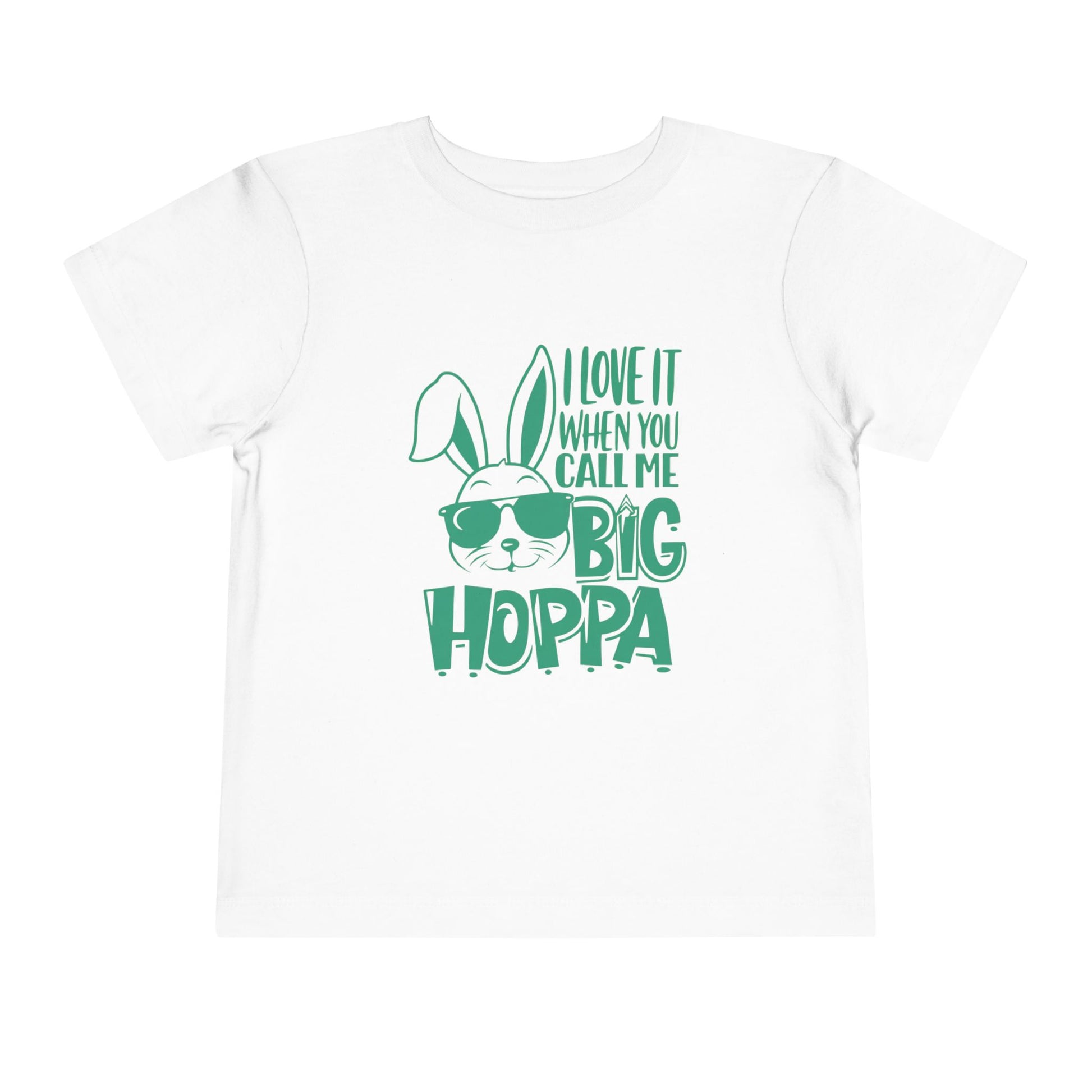 White t-shirt with green bunny graphic and text on a white background