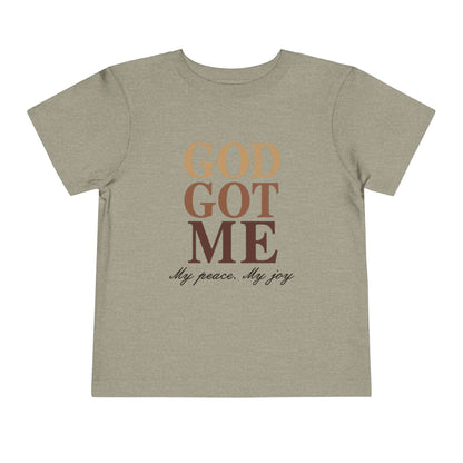Beige t-shirt with 'GOD GOT ME My peace. My joy' text on a white background