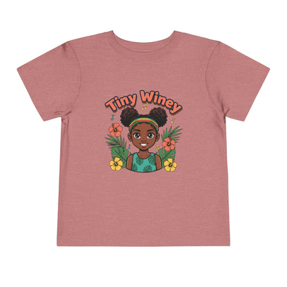Pink t-shirt with a graphic of a girl with flowers and 'Tiny Winey' text on a white background