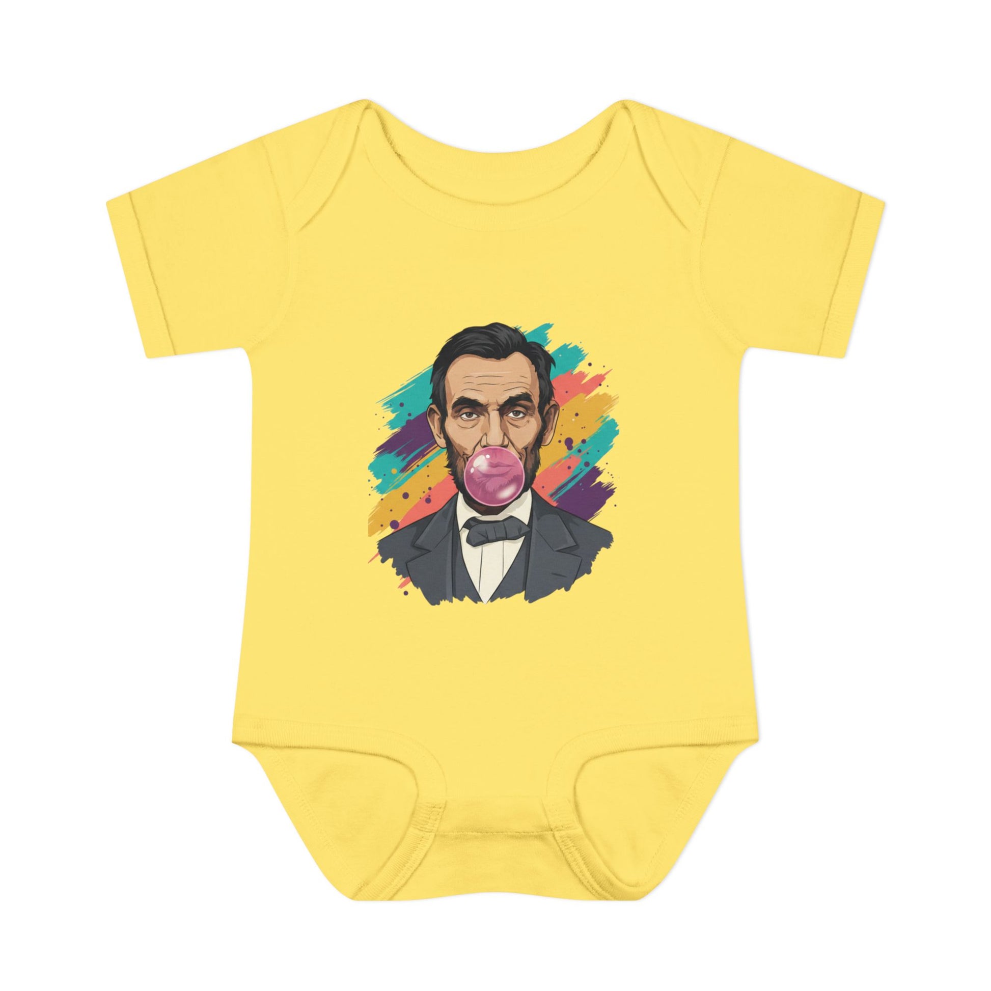 Yellow baby onesie with a colorful graphic of a historical figure on a white background