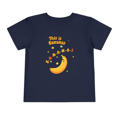 Navy blue t-shirt with a banana character and text on a white background