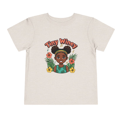 Beige t-shirt with a graphic of a girl and 'Tiny Winey' text on a white background