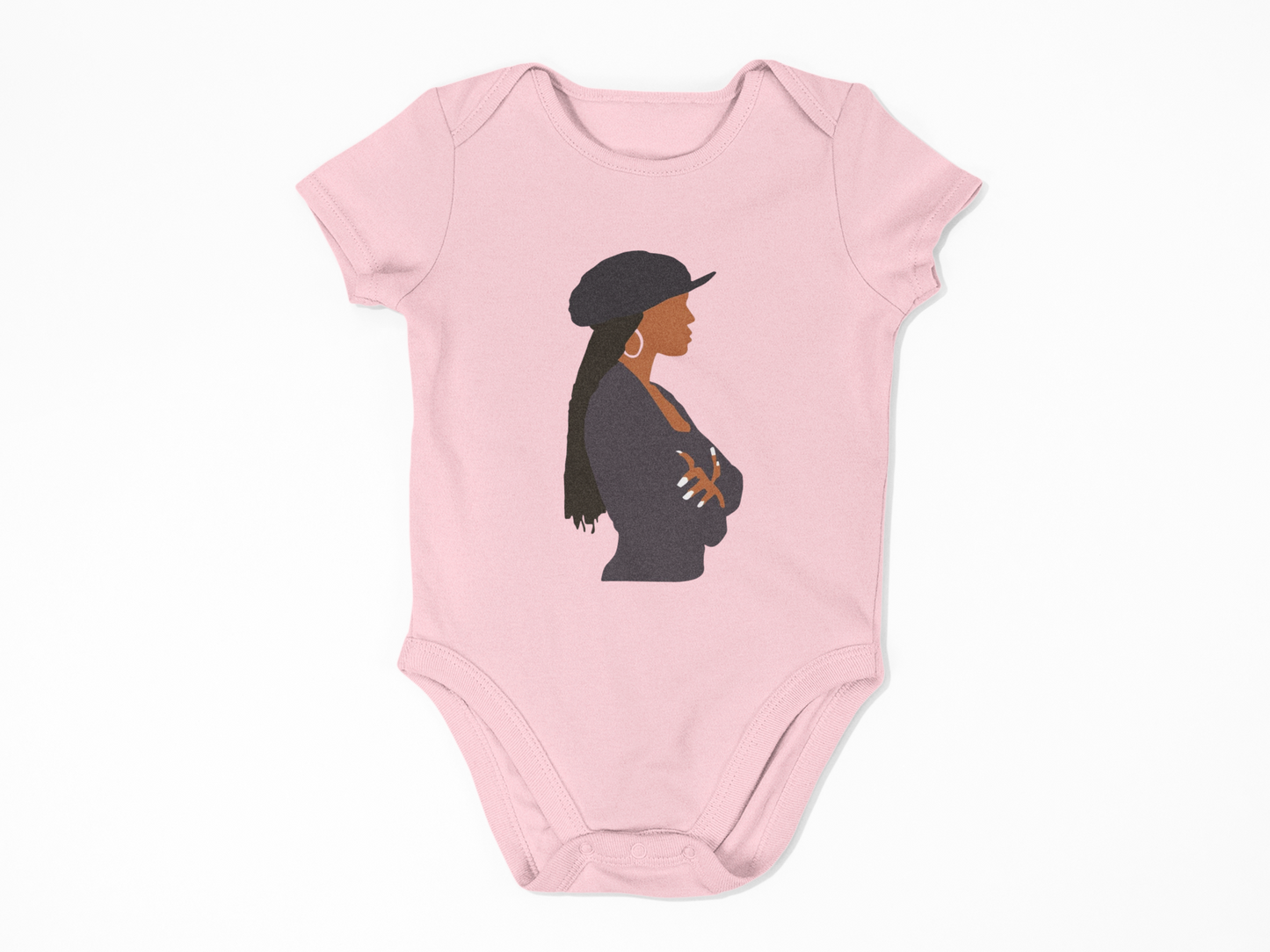 Pink baby onesie with a silhouette of a woman wearing a hat on a white background